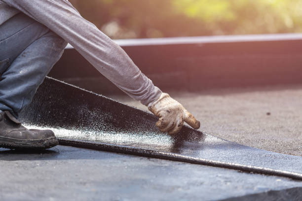 Professional Waterproofing technician working in Corning, NY